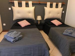Voodi või voodid majutusasutuse Blue Eagle Guesthouse - Casa de hospedes toas