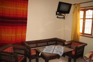 Televisyen dan/atau pusat hiburan di Ecolodge Espace Tamount