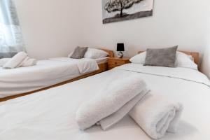 Postel nebo postele na pokoji v ubytování Apartment Anđela