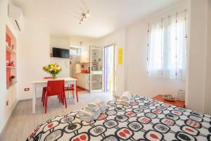 A bed or beds in a room at LE NOBILI DIMORE - appartamenti a Gallipoli