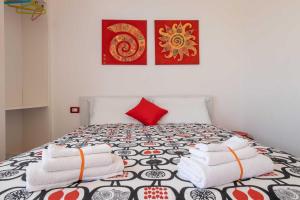 A bed or beds in a room at LE NOBILI DIMORE - appartamenti a Gallipoli