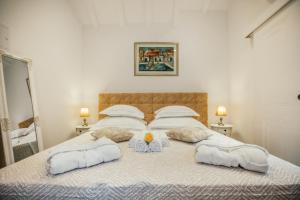 Postel nebo postele na pokoji v ubytování Heritage Hotel Dea Hvar
