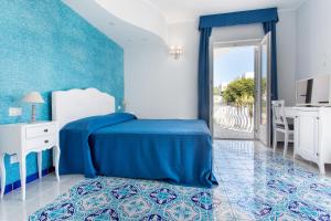 Postel nebo postele na pokoji v ubytování Odysseus Hotel + 37 fotografií