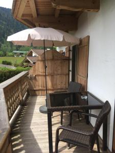 Svalir eða verönd á Apartment Hahnenkammblick
