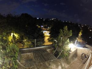 a view of a park at night at Meydan Suites in Istanbul