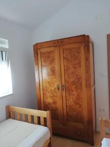 Postel nebo postele na pokoji v ubytování Apartment Dario