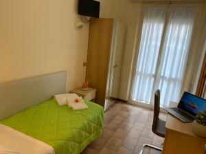 TV a/nebo společenská místnost v ubytování Hotel Palma Benessere