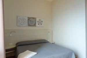 Posteľ alebo postele v izbe v ubytovaní Hotel Bue Marino + 35 fotografií