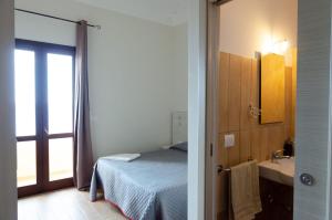 Posteľ alebo postele v izbe v ubytovaní Hotel Bue Marino