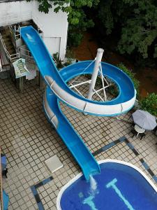 A piscina em ou perto de Hotel Orquidea Dorada R
