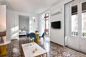 TV a/nebo společenská místnost v ubytování Gran Vía Luxury 3BR