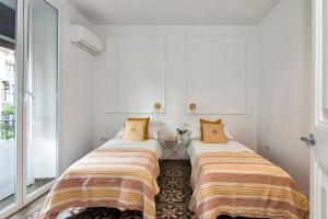 Postel nebo postele na pokoji v ubytování Gran Vía Luxury 3BR