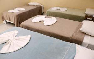 Postel nebo postele na pokoji v ubytování Hotel Capuchins