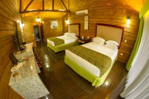 Postel nebo postele na pokoji v ubytování Baldi Hot Springs Hotel & Spa