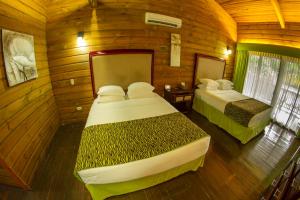 Postel nebo postele na pokoji v ubytování Baldi Hot Springs Hotel & Spa
