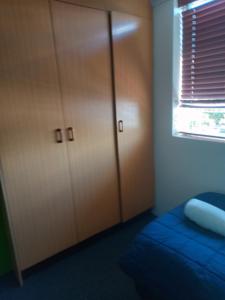 Postel nebo postele na pokoji v ubytování Annerley Motor Inn