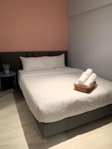 Ένα ή περισσότερα κρεβάτια σε δωμάτιο στο Seaview 2bed 2bath 19Fl at Veranda Residence Pattaya +28 φωτογραφίες
