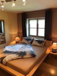Ένα ή περισσότερα κρεβάτια σε δωμάτιο στο Haus Freynend