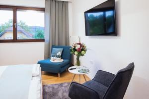 TV a/nebo společenská místnost v ubytování Pension Auszeit Velden