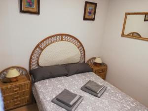 Postel nebo postele na pokoji v ubytování Cunit Playa