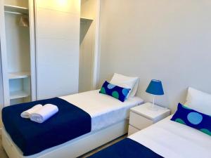 Кровать или кровати в номере Playa Los Álamos, descanso y ocio en Torremolinos