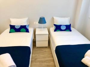 Кровать или кровати в номере Playa Los Álamos, descanso y ocio en Torremolinos