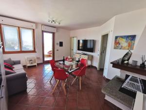 Μια τηλεόραση ή/και κέντρο ψυχαγωγίας στο Visit Cagliari - Suite Panoramic on Cagliari skyline & Poetto Beach