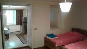 Postel nebo postele na pokoji v ubytování Mti House