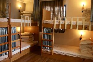 Postel nebo postele na pokoji v ubytování Travel light hostel