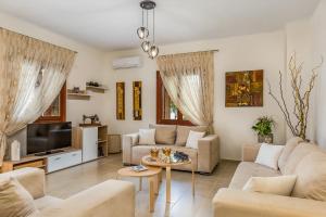 Posezení v ubytování Olive Grove Apartment