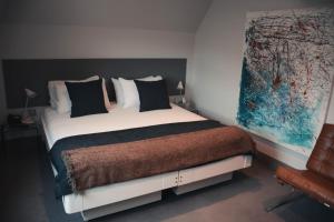 Ένα ή περισσότερα κρεβάτια σε δωμάτιο στο Hotel 55