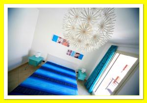A bed or beds in a room at LE NOBILI DIMORE - appartamenti a Gallipoli