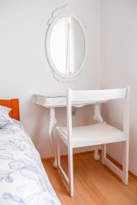 Postel nebo postele na pokoji v ubytování Apartman Skroza