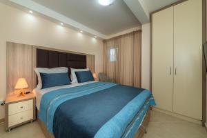 Krevet ili kreveti u jedinici u okviru objekta Apartmani Tref