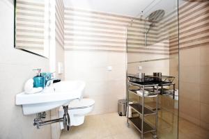 Vonios kambarys apgyvendinimo įstaigoje DUKES Apartments - Wita Stwosza