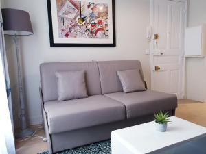A seating area at Apartment Quartier Latin - Mouffetard