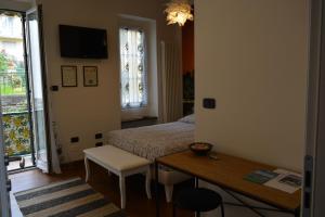 Televízia a/alebo spoločenská miestnosť v ubytovaní ilGirasole b&b
