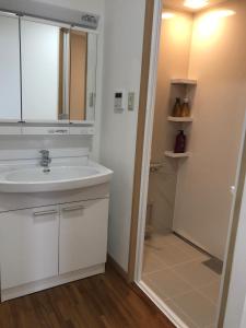 Koupelna v ubytování LAKA.M -ラカ ドット エム-