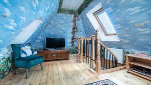 TV a/nebo společenská místnost v ubytování Parus Boutique Hotel