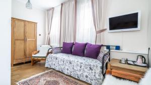 TV a/nebo společenská místnost v ubytování Parus Boutique Hotel