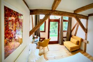 Ein Sitzbereich in der Unterkunft Mühle Tornow am Wentowsee