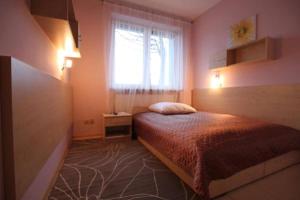 Posteľ alebo postele v izbe v ubytovaní Standard Delegacyjny Bed & Breakfast