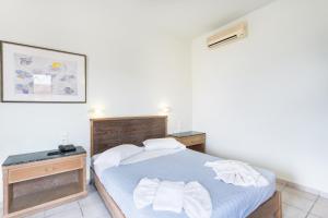 Posteľ alebo postele v izbe v ubytovaní Alonia Hotel Apartments
