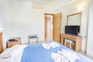 Posteľ alebo postele v izbe v ubytovaní Alonia Hotel Apartments