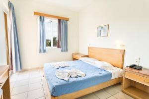 Posteľ alebo postele v izbe v ubytovaní Alonia Hotel Apartments