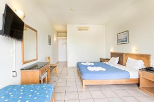 Posteľ alebo postele v izbe v ubytovaní Alonia Hotel Apartments