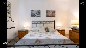 Säng eller sängar i ett rum på Via del Toppo, 4