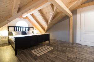 Postel nebo postele na pokoji v ubytování Apartmány MALIK