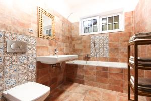 Koupelna v ubytování Apartmány MALIK + 11 fotografií