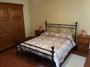 Posteľ alebo postele v izbe v ubytovaní La Casa del Gigli